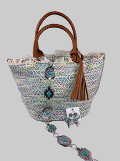 Handbag with wooden handle and decorative elements on a white surface